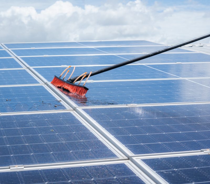 labor working on cleaning solar panel at solar power plant,Professional cleaning,Solar panels.
